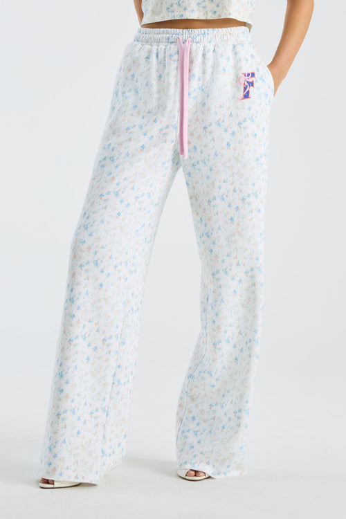 Ilyra sweatpants in light blue speckle print, pink drawstring, wide leg with cuffs