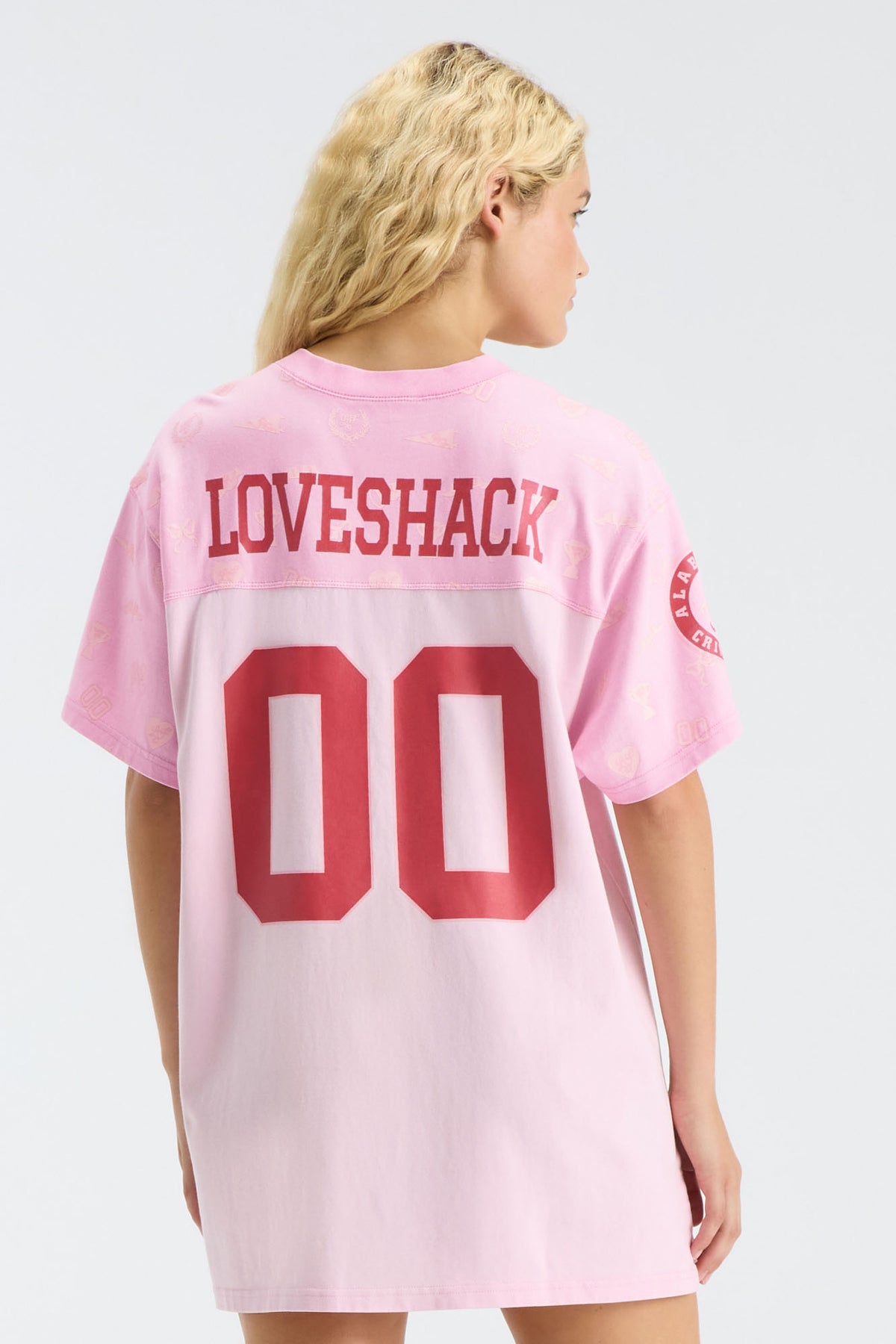 Pink jersey varsity crush dress with large back LOVEShack and 00 graphic