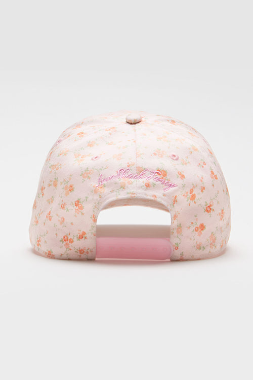 White floral baseball cap with pink underbill