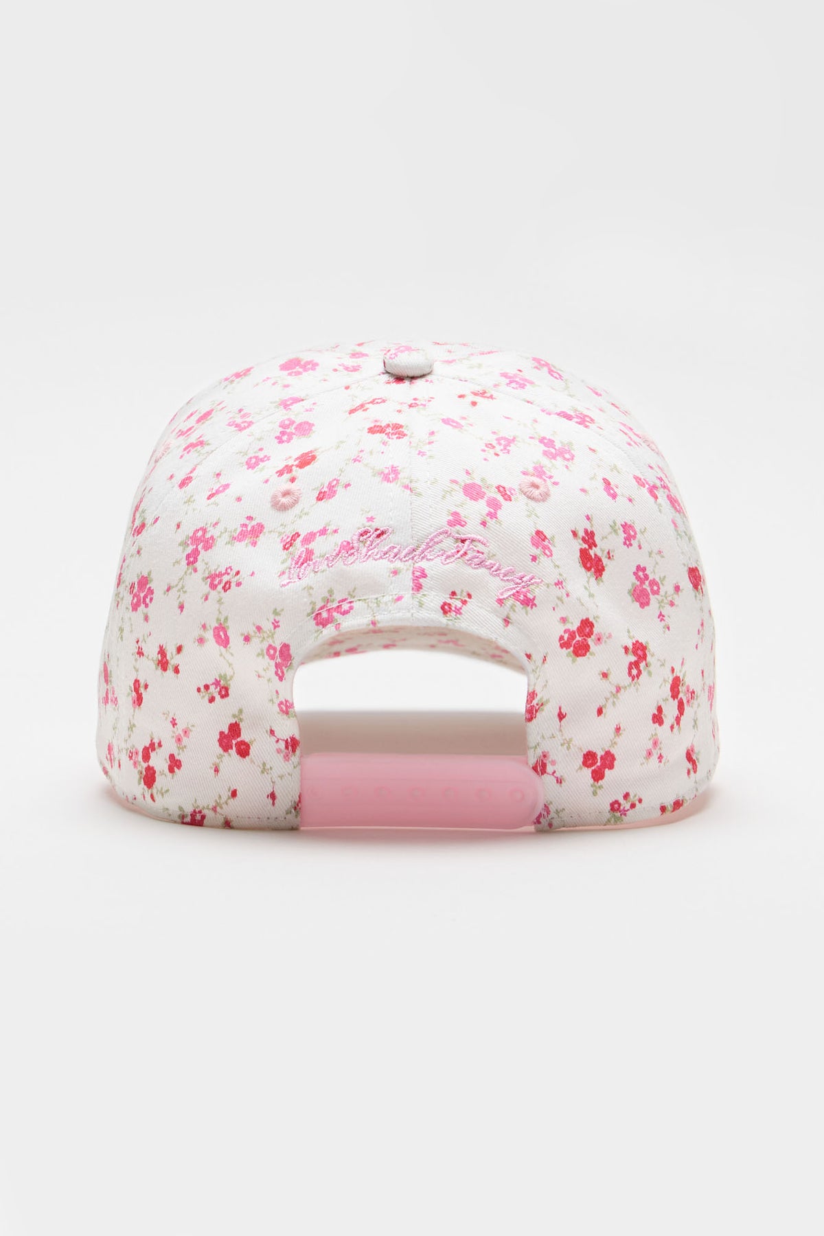 Pink floral baseball cap with curved brim and light pink interior sweatband