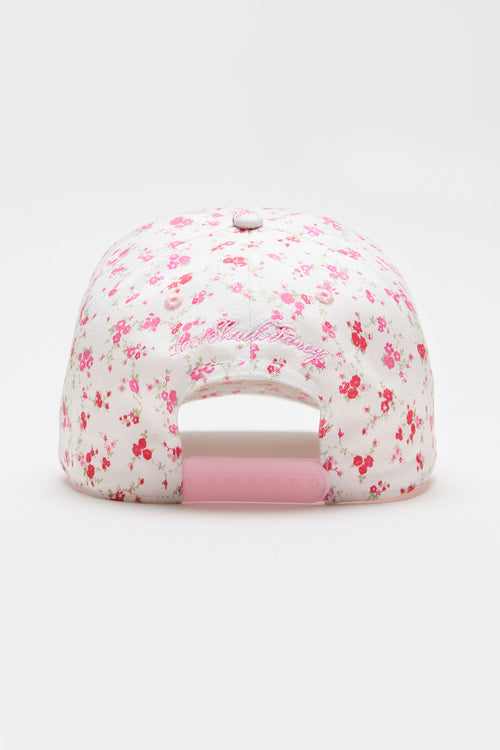 Pink floral baseball cap with curved brim and light pink interior sweatband
