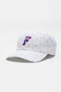 White floral baseball cap with blue-and-red team logo