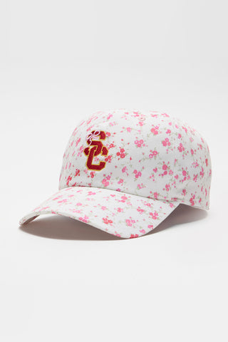 White floral baseball cap with red "S" logo