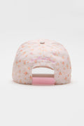Light pink floral baseball cap with front cursive logo text
