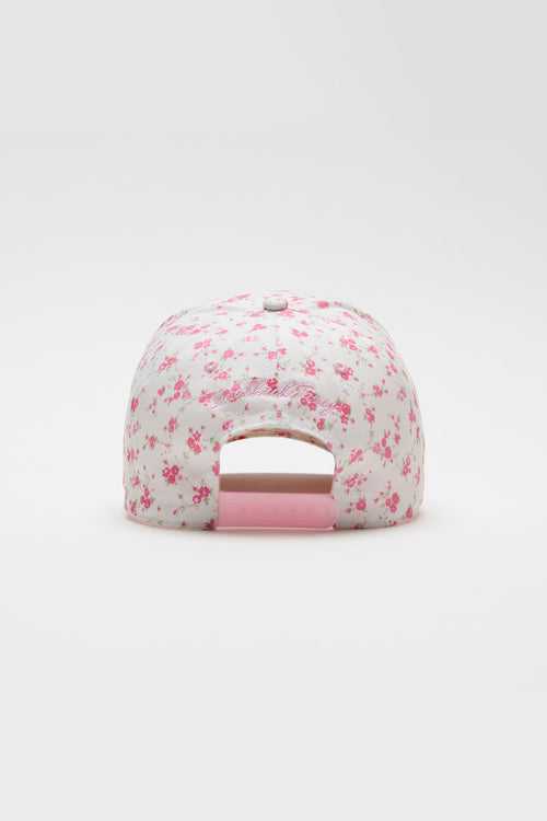 Pink floral baseball cap with open mesh back panel and small scattered prints
