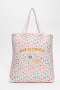 White tote bag with pink floral pattern and large printed logo graphic