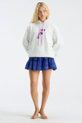 Blue ruffle mini skirt with layered tiers and scalloped lace hem.