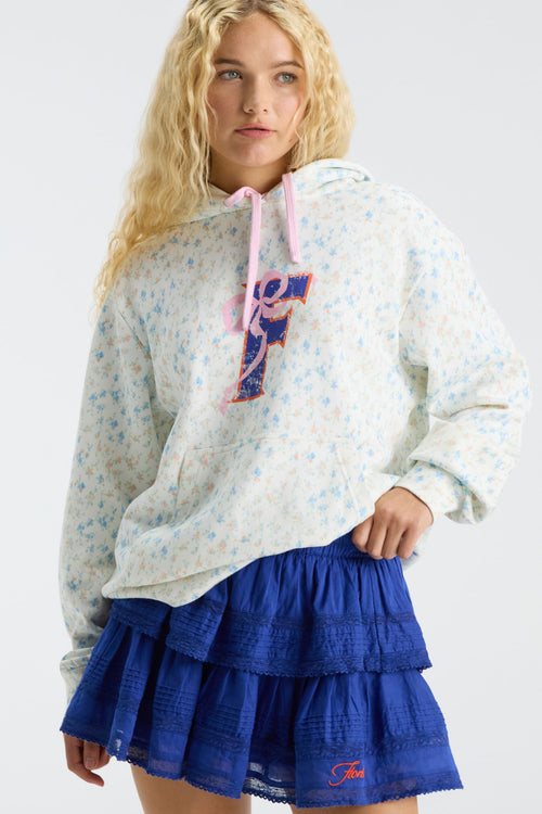 Navy-blue ruffle mini skirt with tiered ruffles and elastic waist.