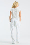 Fanatics x LoveShackFancy light floral ringer tee back view, cap sleeves, no visible graphic