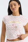 Fanatics x LoveShackFancy floral ringer tee with football graphic and gold "85" print