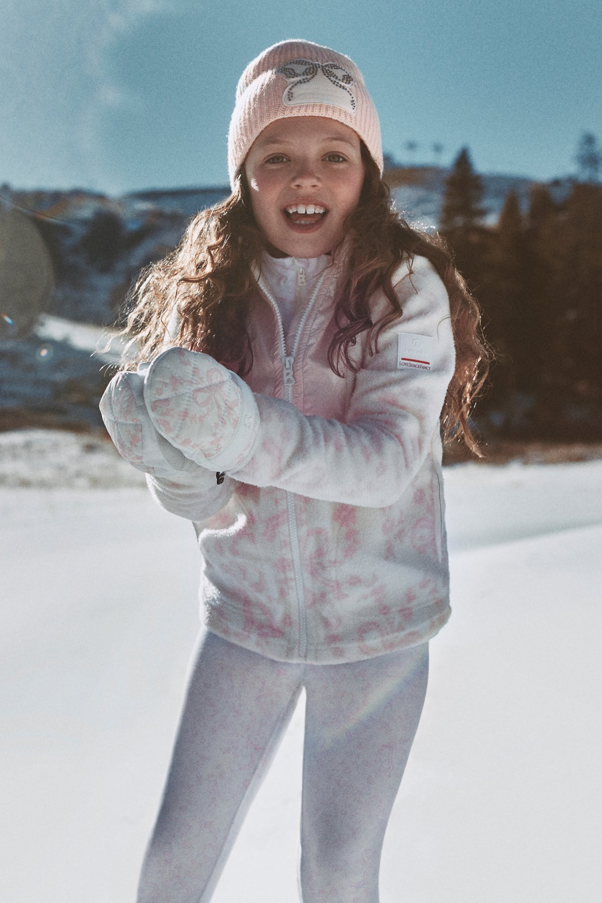 Girls chantilly pink jersey pants with allover print, elastic waistband and fitted ankles