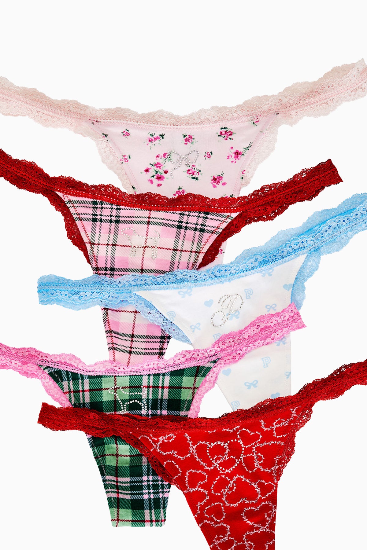Pack of five cotton thong panties with lace trim, assorted prints including floral and plaid