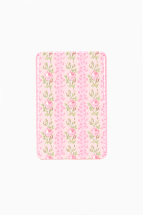 Pink floral wireless portable charger with repeating rose-pattern print