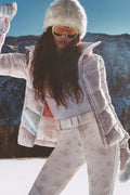 Women’s white half-zip pullover with subtle allover pattern and long sleeves
