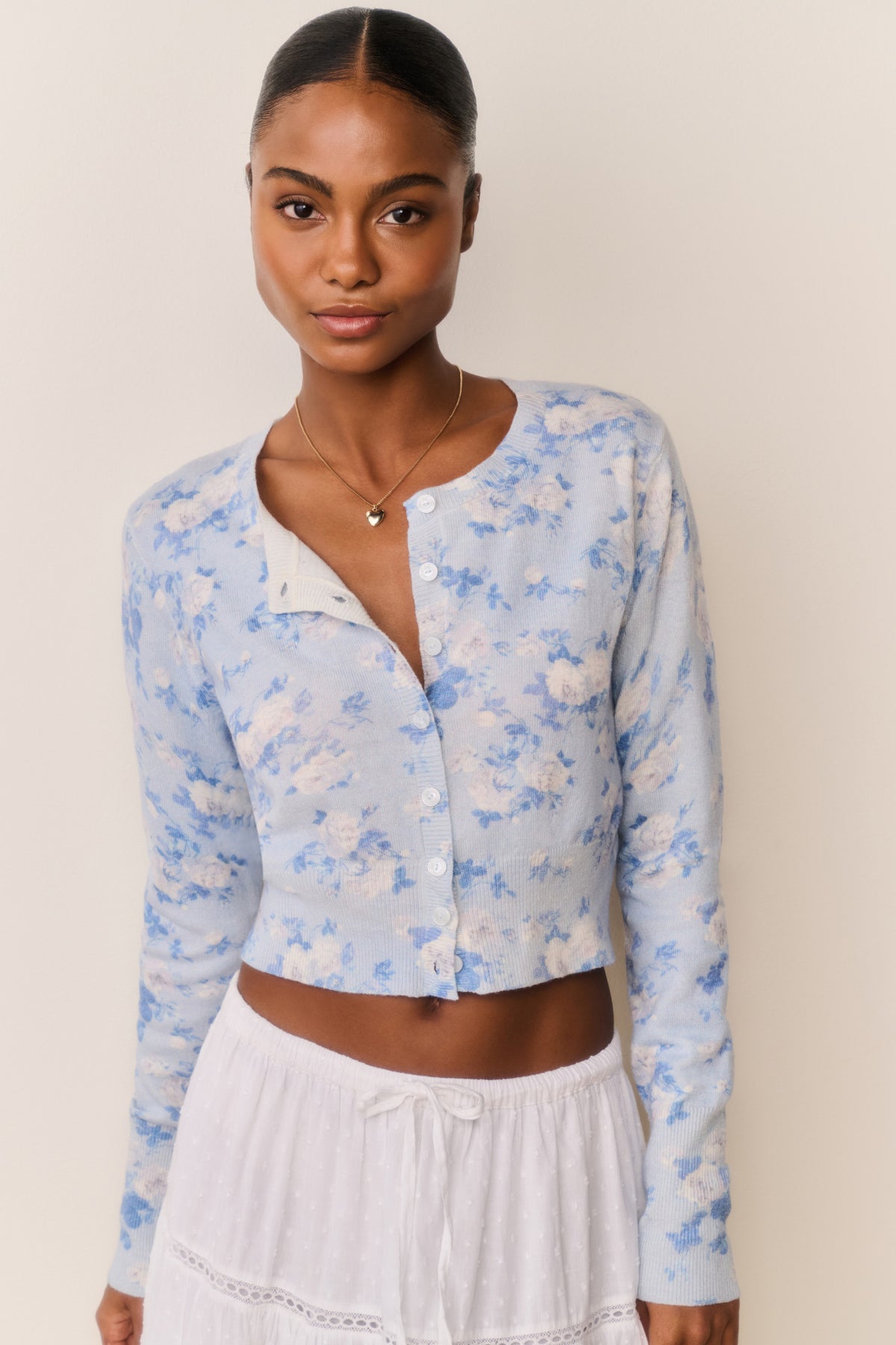 Floral print cotton cardigan in pale blue with button-front and long sleeves