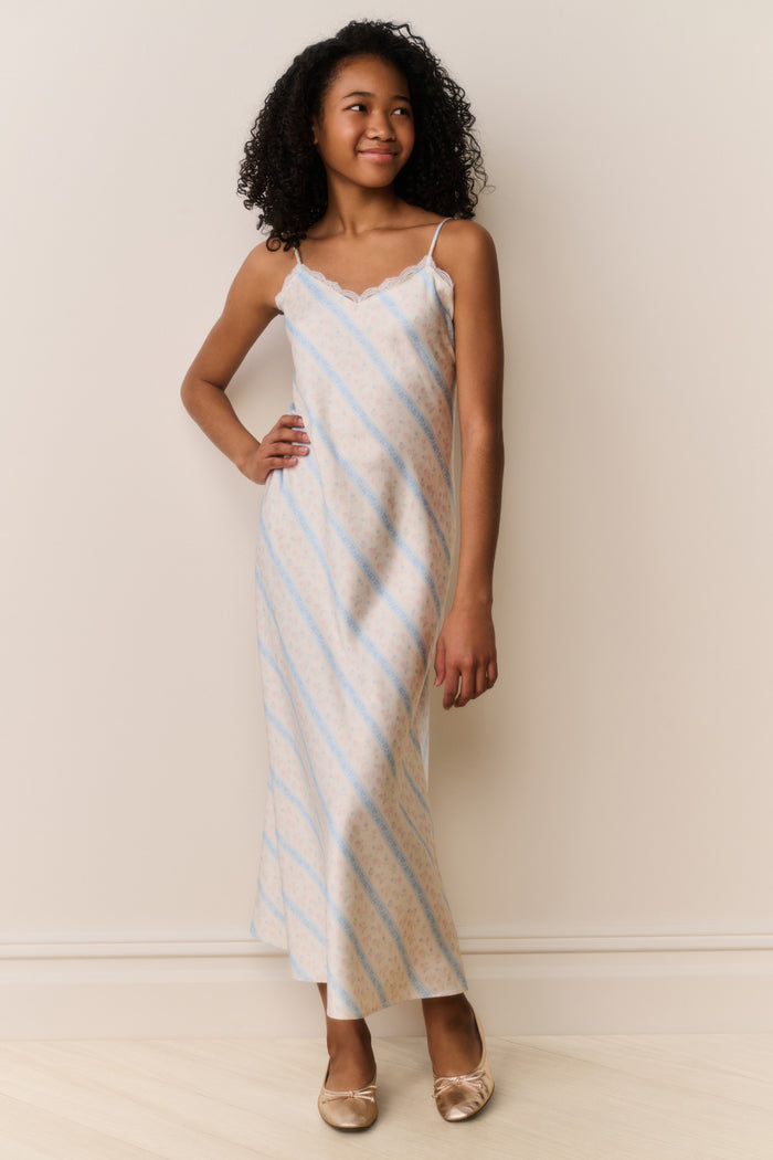 Light blue and white striped sleeveless maxi dress with thin spaghetti straps and straight hem