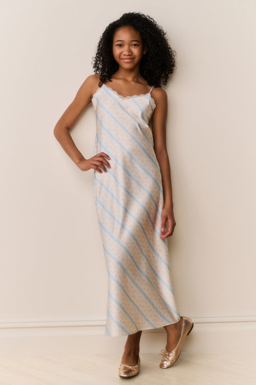 Light blue and white striped sleeveless maxi dress with spaghetti straps and fitted bodice