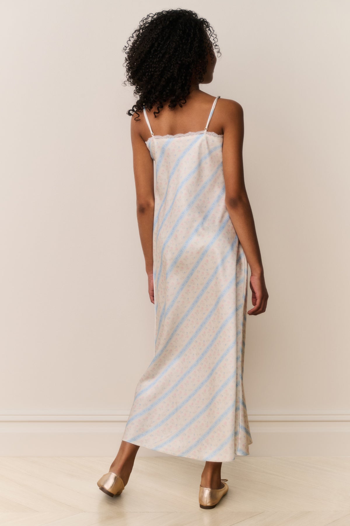 Light blue and white striped maxi dress with spaghetti straps, open back