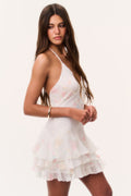 White silk chiffon mini halter dress with pastel print and tiered ruffle skirt