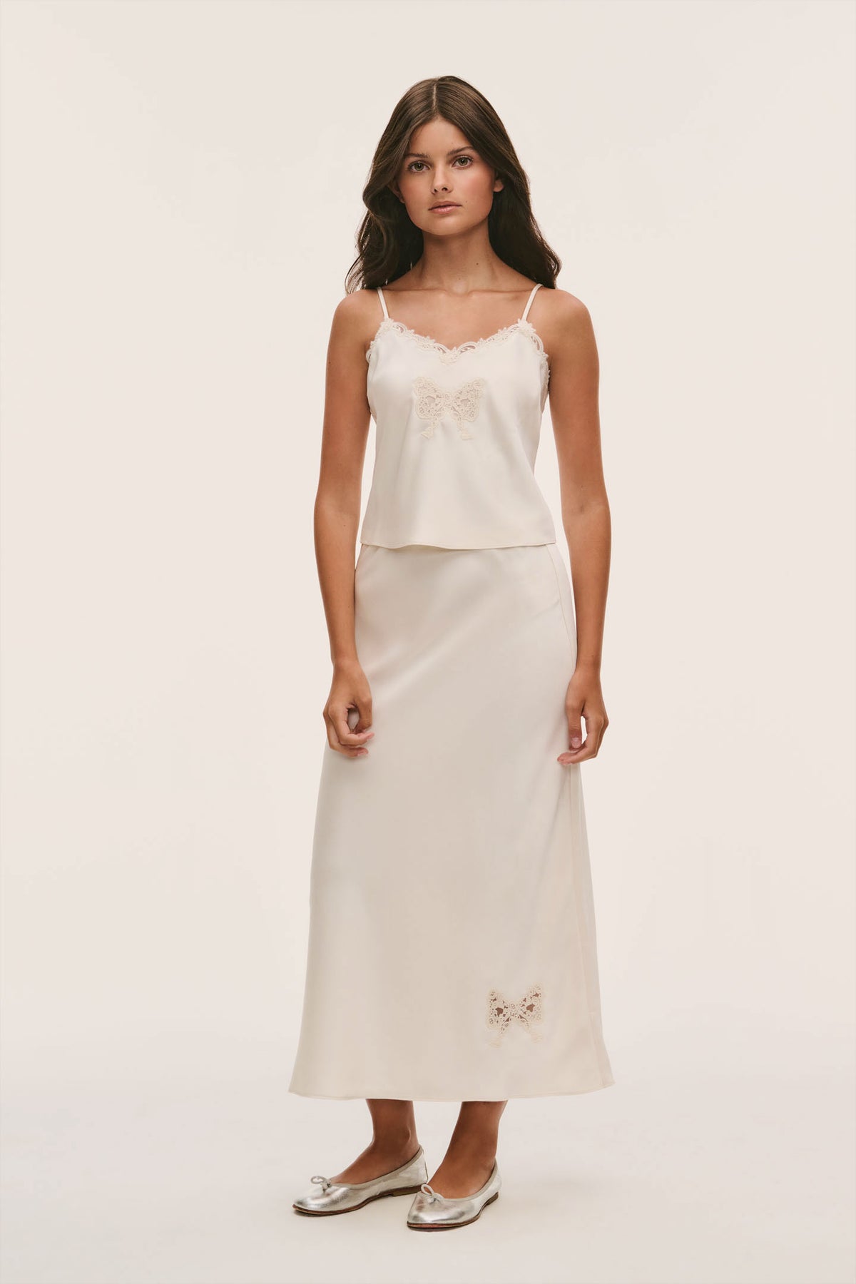 Light cream lace-trim cami with V-scalloped bust overlay and thin spaghetti straps