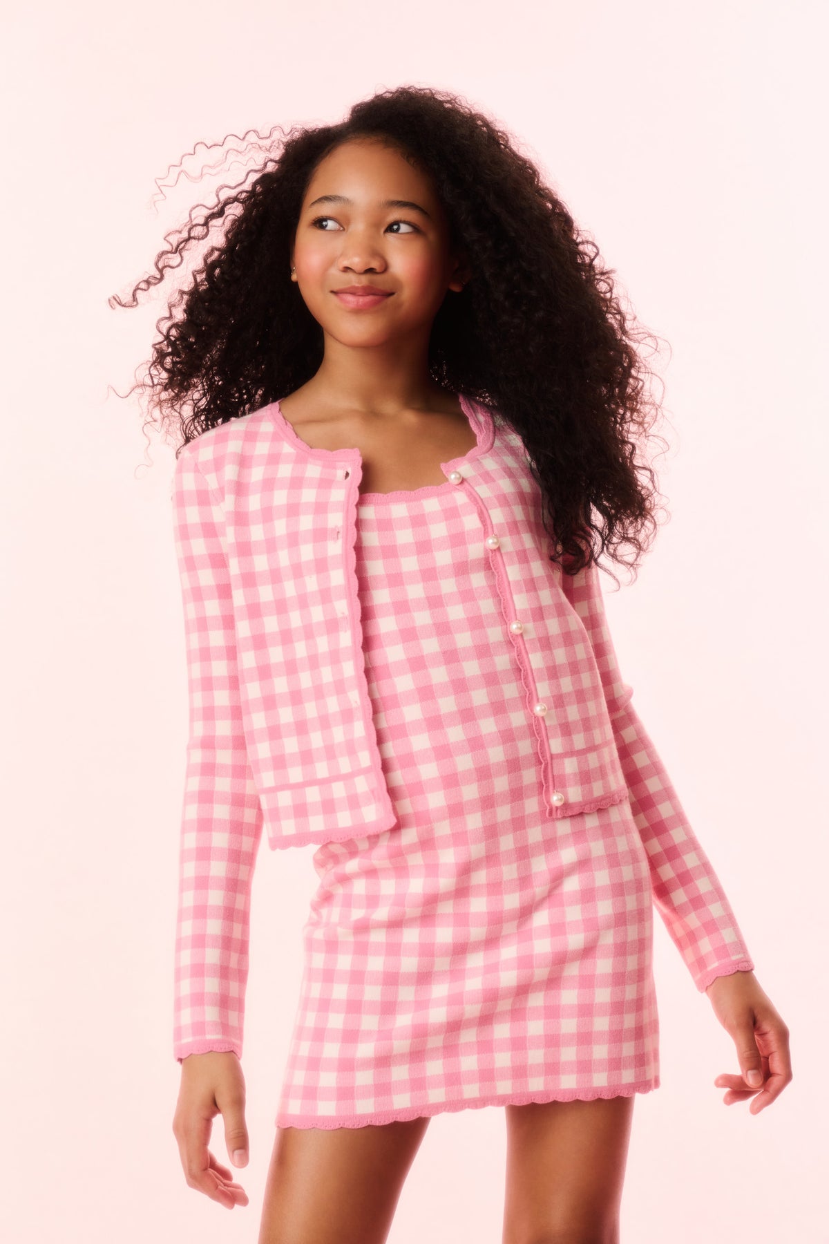 Pink checkered knit jacket with square neckline, button front, long sleeves
