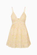 Floral mini dress with spaghetti straps and tiered ruffle hem, light yellow base