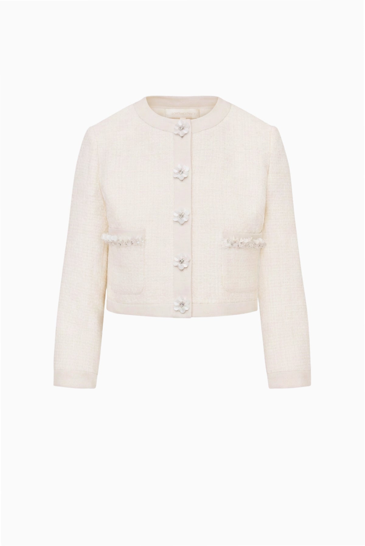 Tween tweed jacket front view in light ivory, buttoned with two flap pockets