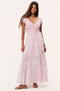 Floral cotton maxi dress with V-neck, puff sleeves, smocked bodice, and tiered skirt