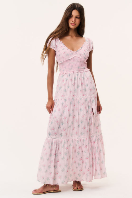 Floral cotton maxi dress with V-neck, puff sleeves, smocked bodice, and tiered skirt