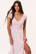 Floral cotton maxi dress with scalloped V-neck, puff sleeves, and front slit