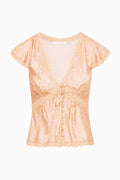 Silk-blend floral top, blush floral print, v-neck tie-front, lace flutter sleeves (flat lay)