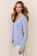Light blue cashmere cardigan with button front, V-neck, and long sleeves