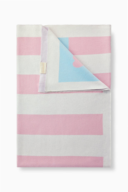 Weathered rose blanket with pink/white stripes, blue star panel, stitched hem