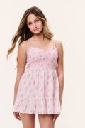 Tween pink floral babydoll-style tiered dress with spaghetti straps