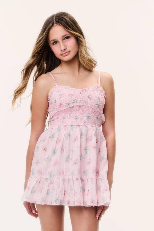 Tween pink floral babydoll-style tiered dress with spaghetti straps