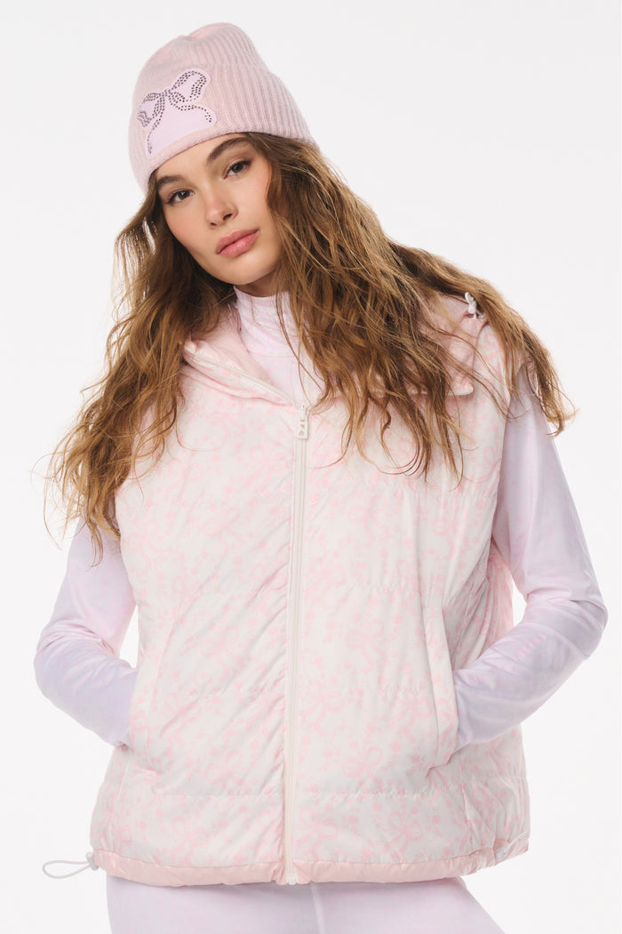 Light pink printed puffer vest with hood up and front zipper
