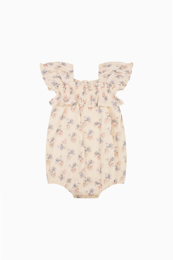 Baby cotton pinafore in light cream with small floral print and flutter sleeves