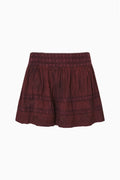 Faded merlot cotton Swiss dot mini skirt with tiered ruffle hem, lace trim