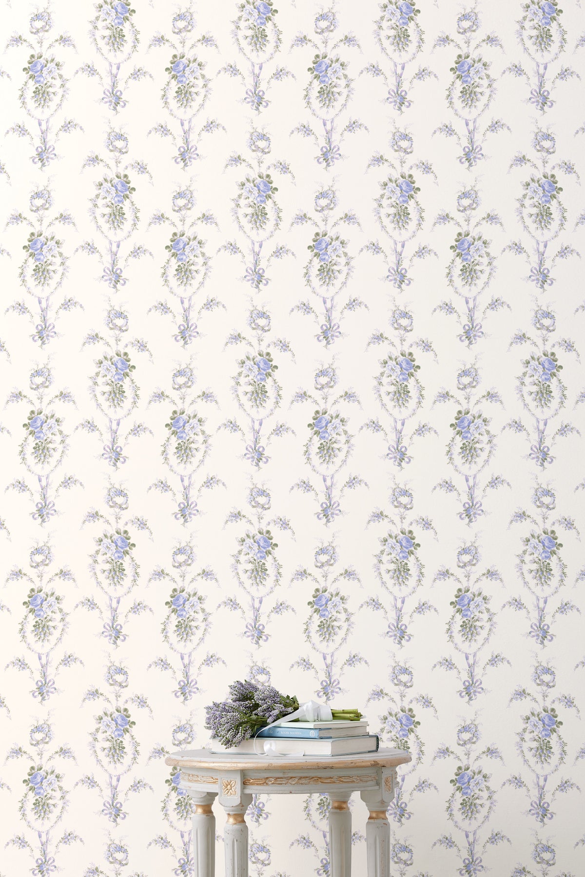 Standard wallpaper roll with repeating blue floral vine pattern on light background