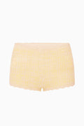 Light yellow knit tweed mini shorts, scalloped lace-trim hem