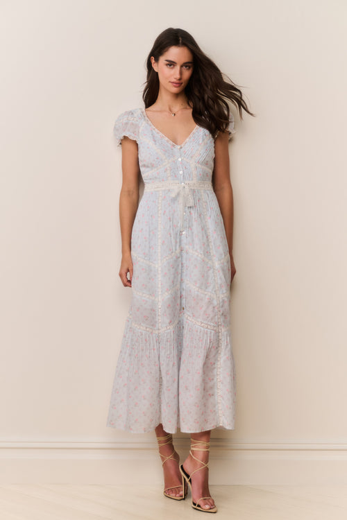 Floral cotton midi dress with puff sleeves, V-neck, and button front; tiered skirt