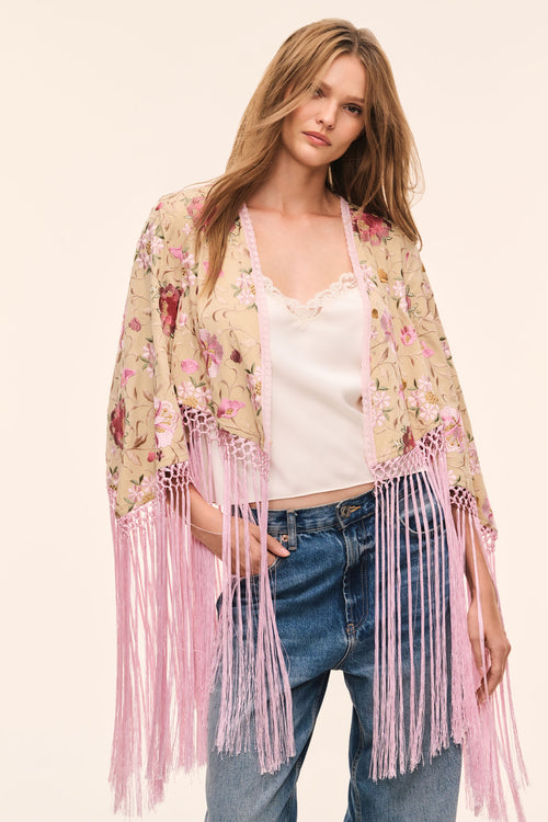 Embroidered floral kimono-style top with pink fringe tassels and lace front