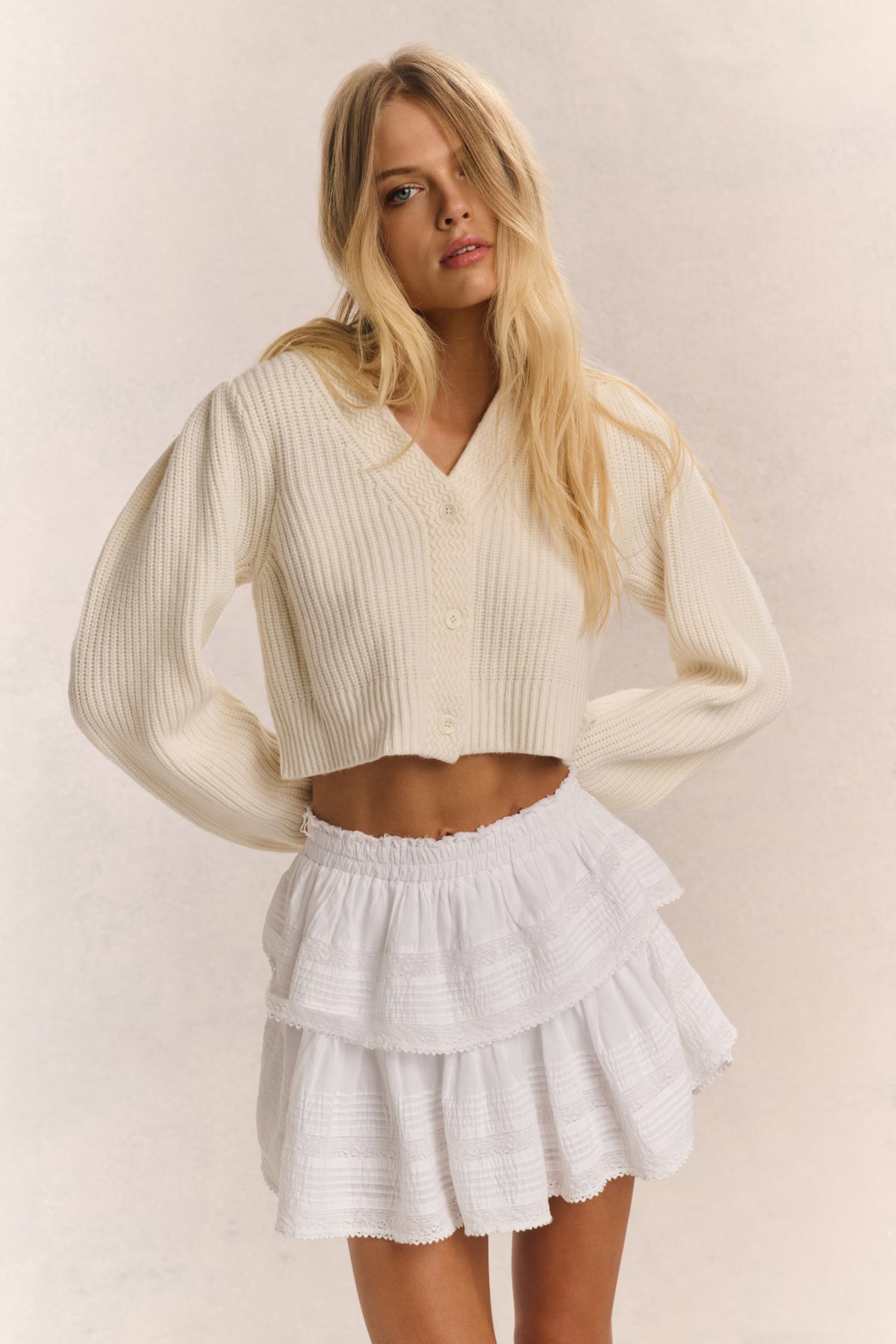 Ivory striped ribbed V-neck crop cardigan with button front and long sleeves