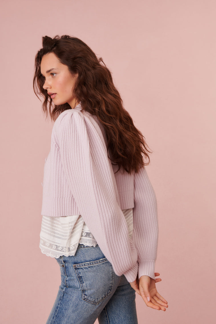 Light pink ribbed cropped V-neck cardigan, back view with long sleeves