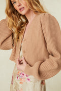 Fawn ribbed cropped V-neck cardigan, close-up of button placket and sleeves