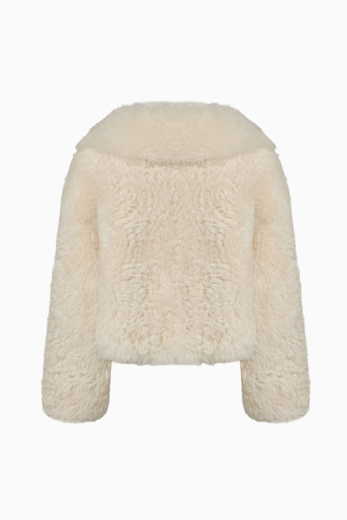 Cream shearling coat with textured back and long sleeves