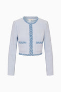 Light blue tweed jacket with denim trim, front button and flap pockets