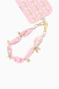Pink floral fabric phone charm lanyard with gold anchor and bow accents