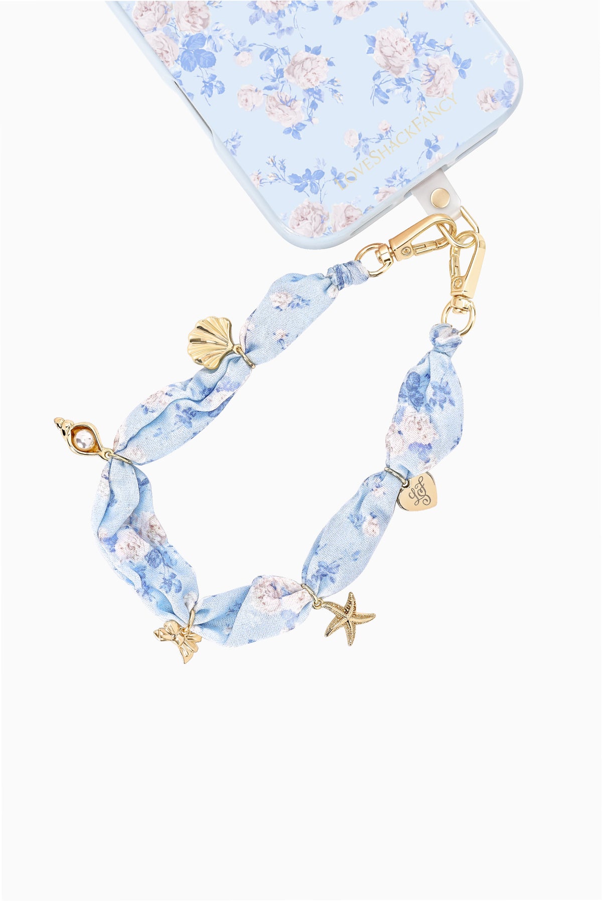 Floral fabric phone charm with gold hardware and starfish accents