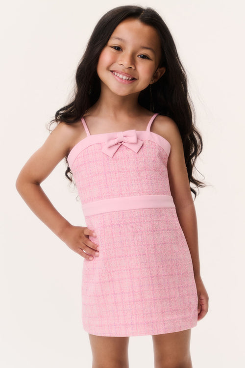 Pink tweed sleeveless dress with bow front and spaghetti straps